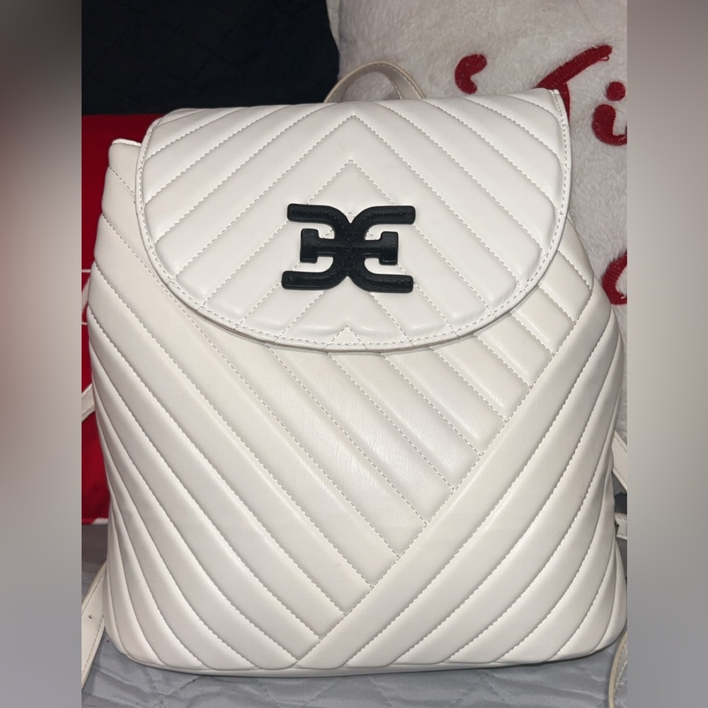 Sam Edelman Martha Flap Backpack in white faux leather